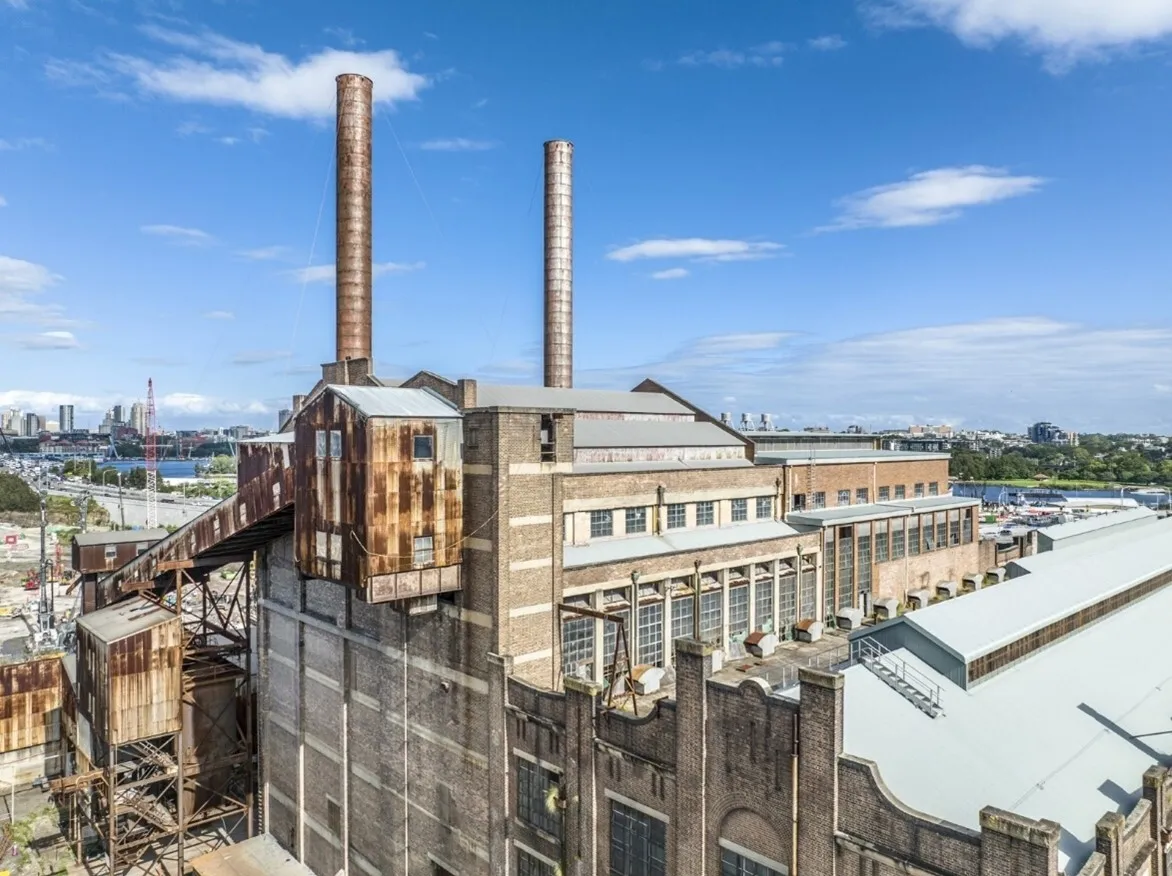 The widely recognised and highly distinctive landmark of the former coal–fired chimney stacks are the inspiration for the White Bay Power Station logo.